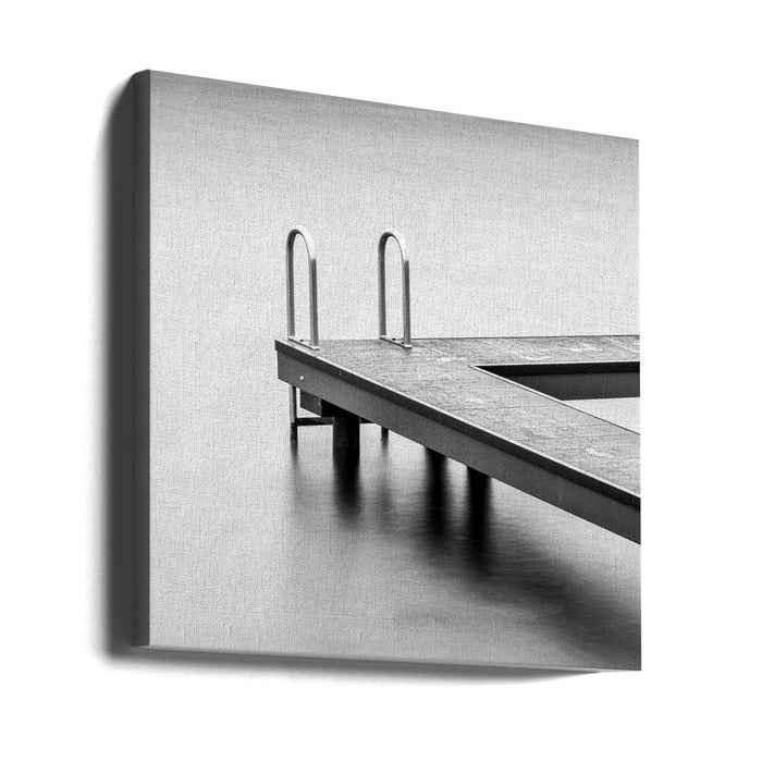 A jetty in a lake Square Canvas Art Print